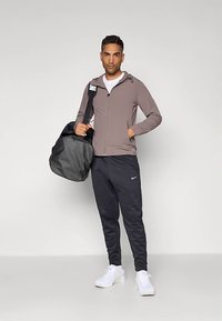 Nike Performance UNLIMITED - Trainingsvest - cave stone/black