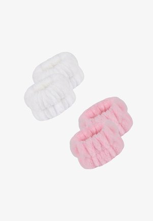 Fuzzy hair scrunchies in white and pink, featuring a ribbed texture and elastic design for secure hold, two of each color.