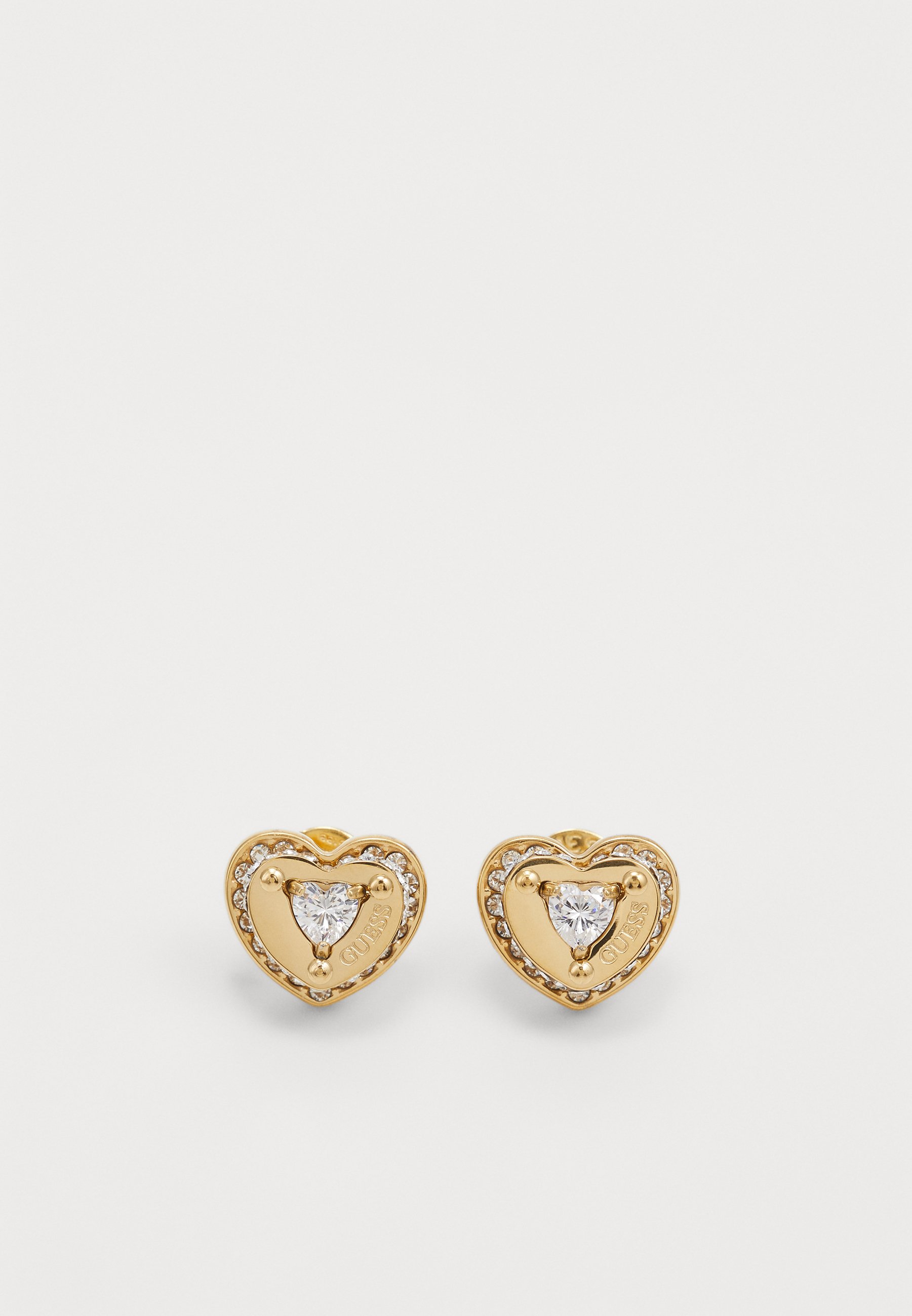 GUESS Orecchini A Cerchio Cuore Dorati: Romanticismo E Stile!
