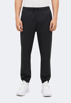 Pier One Sport by Zalando, ESSENTIAL TRAINING WOVEN JOGGERS WITH ZIP POCKETS AND CUFF ZIPPER - Pantalon de survêtement - black