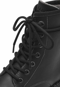 s.Oliver Botas para la nieve - black