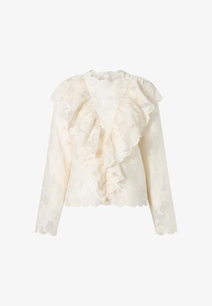 Bluza de dantelă ivoire cu mâneci lungi, margini ondulate și detalii cu volane suprapuse pe față și umeri.