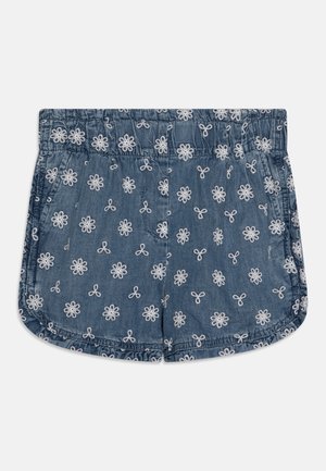 Siniset farkkushortsit, joissa on joustava vyötärönauha ja valkoiset kirjotut kukkakuviot, sivutaskut ja pyöristetyt helmat.