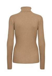 Ribbad brun polotröja med långa ärmar. Tyget är texturerat och passar tätt, vilket framhäver en figurnära silhuett.