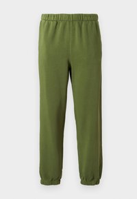 Green sweatpants made of soft fabric. Elastic waistband and cuffs. Straight leg design with no patterns or visible hardware.