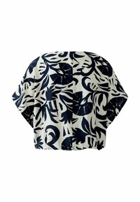 Short loose short-sleeve blouse with black and white abstract floral print and a gathered hem.