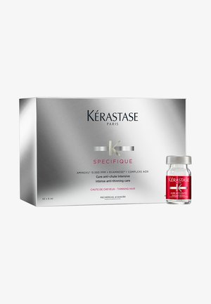 Scatola Kérastase Paris Specifique con design argentato, contiene 42 fiale da 6 ml ciascuna, etichettate per il trattamento dei capelli anti diradamento.