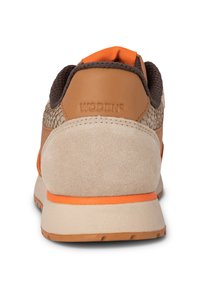 Brown and beige sneaker with suede and mesh materials, rubber sole, orange accents, and WODEN branding on the heel.