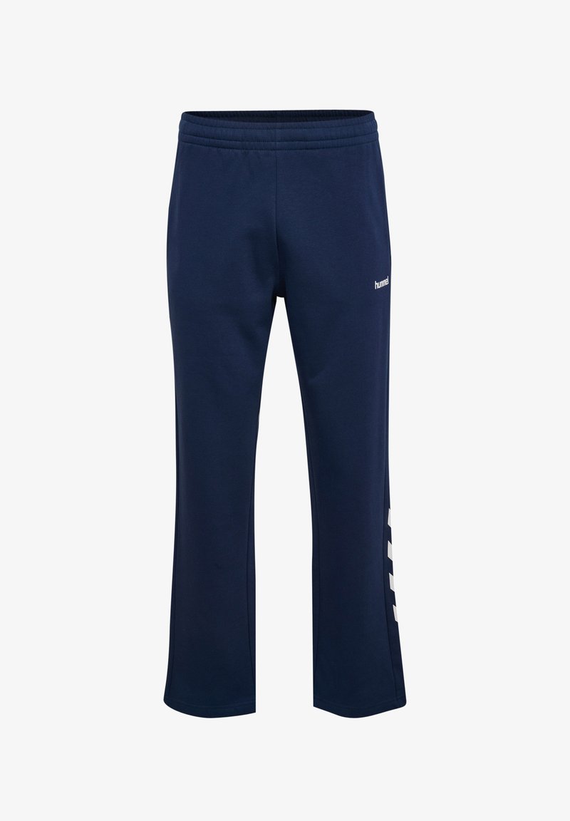 Granatowe spodnie sportowe wykonane z miękkiego materiału, z elastycznym pasem, rozszerzanymi nogawkami i białymi akcentami logo po bokach.