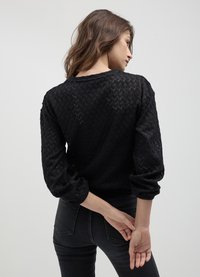 Calliope TRAFORATA CON ROUCHES - Maglione - nero