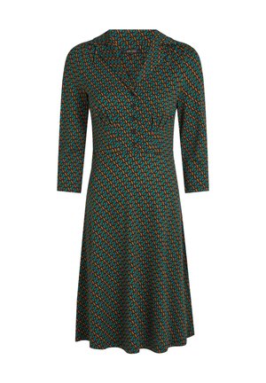 Robe verte avec des manches trois quarts, présentant un motif géométrique en orange et bleu. Décolleté en V et jupe évasée. Tissu doux.