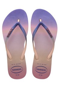Roza in vijolične gumijaste japanke s teksturirano podlogo in kontrastnimi trakovi. Na podlogi je vtisnjen logo Havaianas.