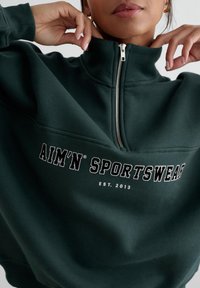 aim’n® VARSITY HALF - Felpa - deep emerald