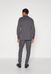 adidas Originals MANCHESTER UNITED ICON TRACK PANT - Klubbklær - utility black