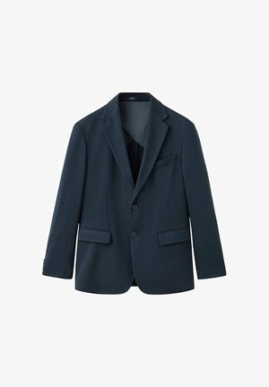 Laivastonsininen teksturoitu bleiseri, jossa on lovettu kaulus, kaksi etutaskua ja kaksi nappia. Vooderattu sisäosa ja yksittäinen rintatasku.