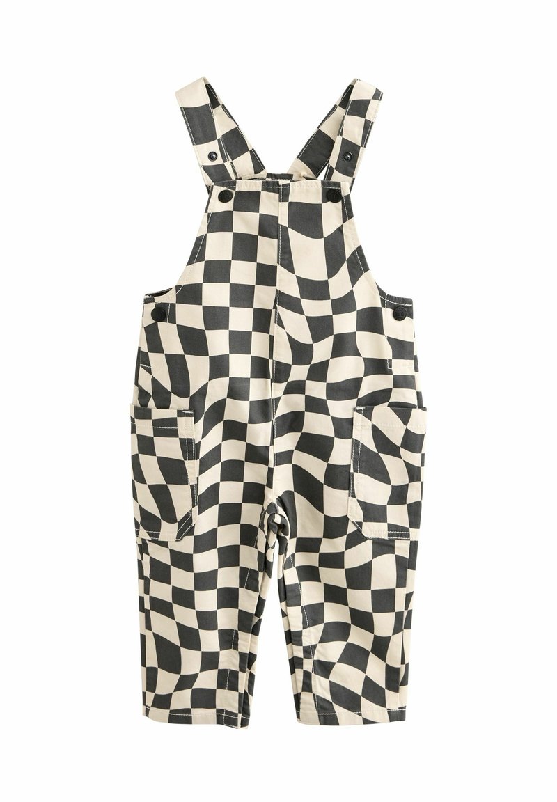 Salopette pour tout-petit à carreaux noir et blanc avec poches avant et bretelles réglables, présentée sur fond blanc.