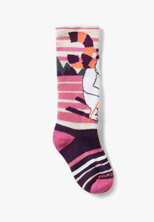 Calzino alta fino al ginocchio con righe multicolori in rosa, bianco e viola; presenta un design grafico di un animale bianco con accenti arancioni.