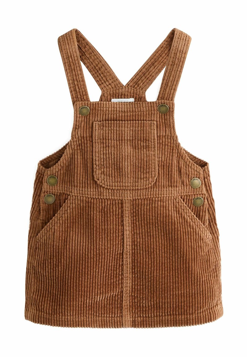 Brune corduroy overalls med lodret ribbning, justerbare stropper, frontlomme og messingknapper på siderne. Blød tekstur.