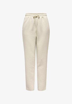 Kremno obarvane flis hlače z elastičnim pasom in vrvico za zategovanje, ravnim krojem hlačnic in stranskimi žepi.