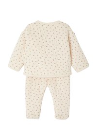 Baumwoll-Pyjama-Set für Babys in Creme mit kleinem Blumenmuster. Mit langen Ärmeln und Hosen, gestepptem Material und runder Halslinie.