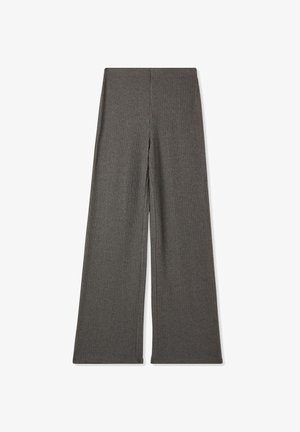 Pantaloni larghi a coste grigi con vita alta. Presentano un tessuto testurizzato e un design pulito e semplice. Nessun tipo di chiusura o motivo visibile.