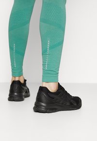 ASICS Leggings - turquoise