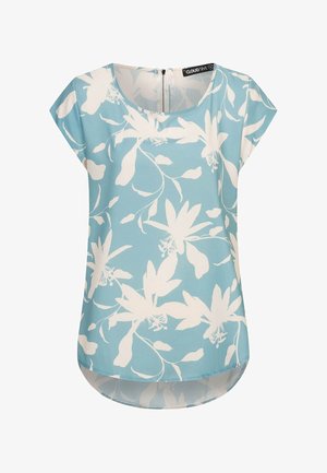 Lichtblauw topje met witte bloemmotieven, ronde halslijn, vleermuismouwen en een licht asymmetrische zoom. Detail van ritssluiting aan de achterkant.