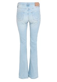 Jasnoniebieskie dżinsy w stylu dzwonów, materiał dżinsowy, średni stan, charakterystyczne tylne kieszenie oraz skórzana etykieta na tylnym pasku.