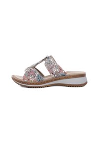 Open-toed sandal featuring multicolored cut-out patterns, leather-like upper, beige insole, and a white textured midsole with brown outsole.
