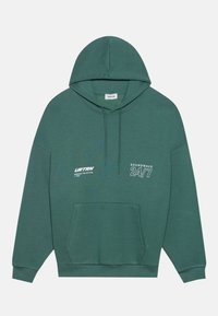 Πράσινο φούτερ με καγκουρό τσέπη, κουκούλα με κορδόνι, και εκτυπωμένο κείμενο "URTRN" και "SOUNDWAVE 24/7" σε λευκό. Μαλακό, υφασμάτινο υλικό.