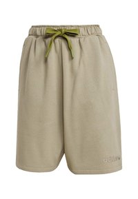 Beige athletic shorts made of soft material, featuring an elastic waistband with a green drawstring and subtle logo detail.