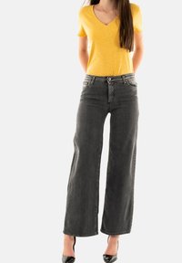 PLEASE Jeans a zampa - gris