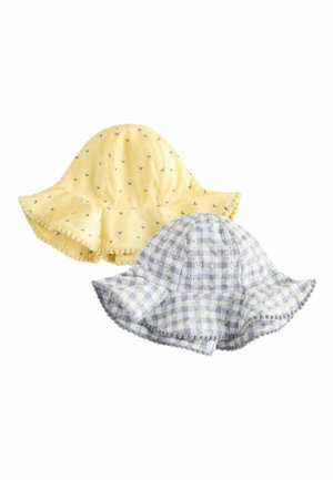 Børnehatte til solen i gul med blomsterprint og gråt ternet design, med brede skygger og dekorative kvast-detaljer.