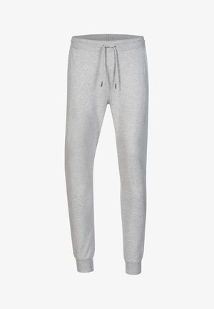 Grijze sweatpants van zacht materiaal, met een elastische tailleband, taps toelopende benen en ribbelen bij de enkels. Geen zichtbare patronen of accenten.
