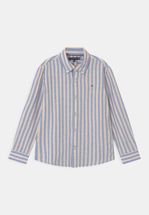 Blau-gelb gestreiftes Hemd mit Knopfleiste und langen Ärmeln, mit Kragen und einem nahe der Brust eingestickten Logo. Aus Baumwollmaterial.