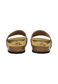 Green slide sandals with open back, cork footbed, and black rubber sole. Smooth texture and minimalistic design with no visible hardware.