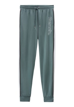 Sweatpants aus türkisfarbenem Material mit weißen Seitenstreifen und schwarzen Akzenten. Verfügt über einen elastischen Bund mit Kordelzügen und einem bedruckten Logo.