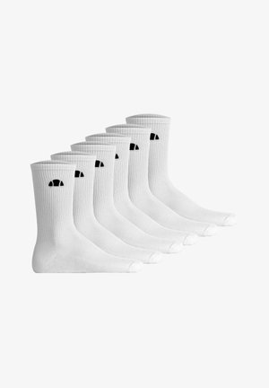 Sechs Paar weiße Sportsocken mit gerippten Bündchen und einem kleinen schwarzen Halbkreis-Logo an den Seiten, nebeneinander angeordnet.