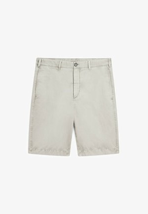 Beige bomulds shorts med lige snit. Har en enkelt knaplukning, bæltestropper og sidelommer. Glat tekstur og enkelt design.