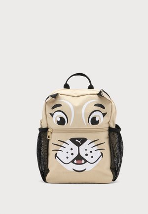 Sac à dos enfant beige avec un visage d'animal de dessin animé, poches latérales en filet noir, une poignée supérieure et une poche avant zippée.