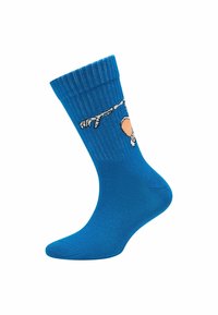 Calzino blu a coste con un design di un braccio e una mano di scheletro in stile cartone animato vicino al polsino, presentato su uno sfondo bianco.