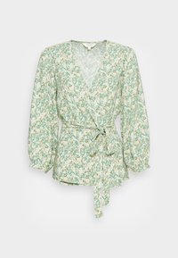 Bloemmotief wikkelblouse met een V-hals, lange pofmouwen en een strik in de taille. Kleuren zijn muntgroen, wit en subtiele gele accenten.