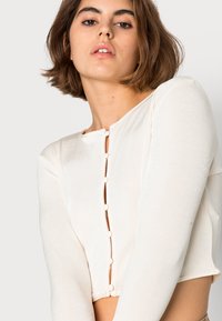 NA-KD Casaco de malha - offwhite