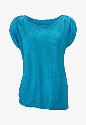 Lyseblå kortærmet bluse med løs pasform og subtilt hvidt plettet mønster, med opsamlede skuldersømme.