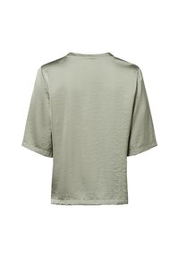 Maglietta a maniche corte di colore verde chiaro, realizzata in un tessuto liscio e leggermente stropicciato. Design semplice con scollatura a girocollo e vestibilità morbida.