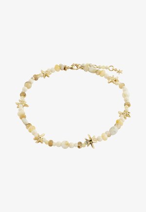Beaded bracelet with cream and beige round stones, accented by small gold starfish charms, and a gold lobster clasp closure.