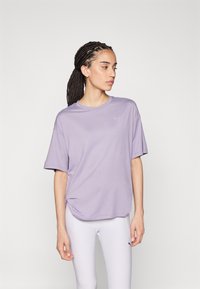 Puma STUDIO TWIST TEE  - Spordi T-särk - pale plum