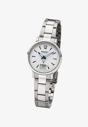 Montre en acier inoxydable argenté avec un cadran rond blanc, des index horaires bleus, des aiguilles noires et un affichage numérique en bas. Marque : Regent.