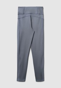 Leggings gris taille haute sans couture avec des coutures visibles et une large ceinture, posés à plat sur un fond blanc.