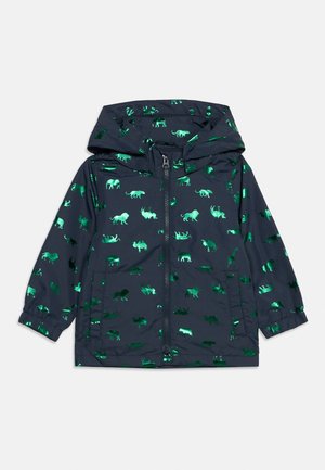 Marineblå hettejakke for barn med glidelås foran og skinnende grønne dyresilhuetter trykt over hele jakken.